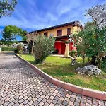 Garden-front House In Апартаменты Бибионе